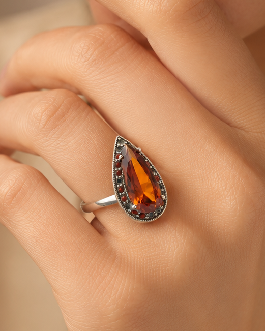 925 Sterling Silver Ring with a Brown Swiss Center Stone