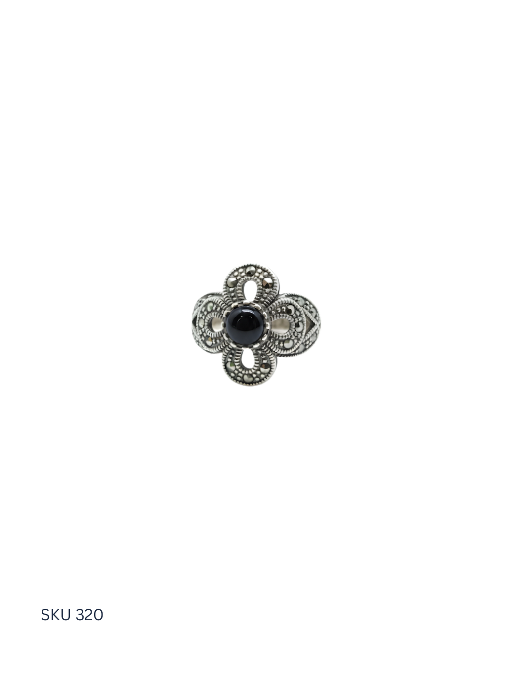 Silver flower-shaped pendant with a black gemstone on a white background