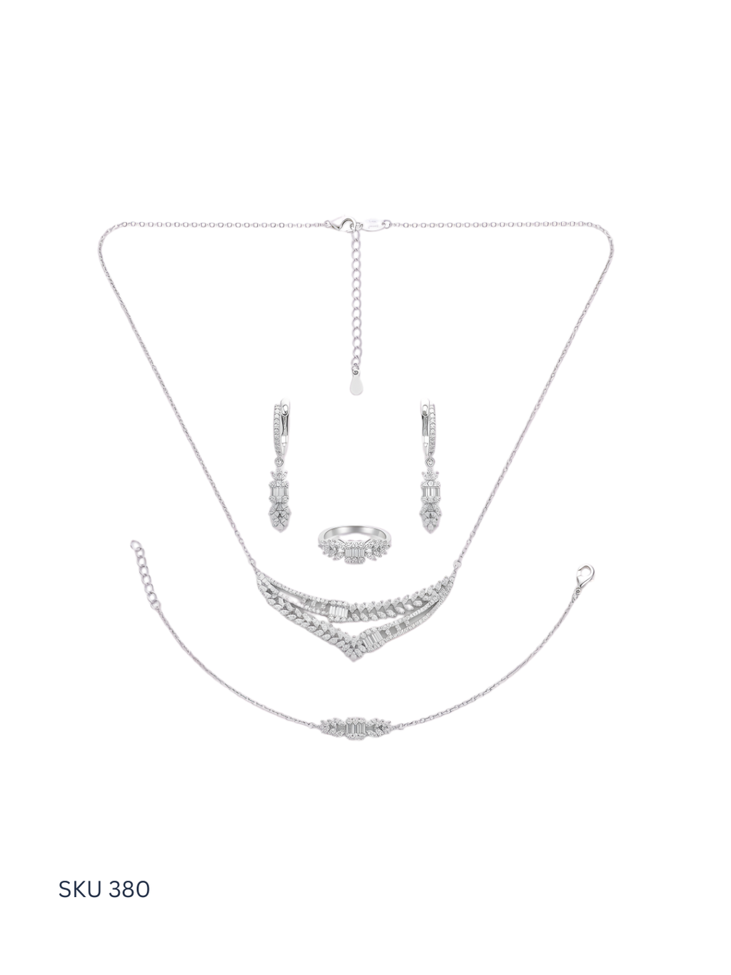 Silver jewelry set with necklace, bracelet, ring, and earrings on a white background.
