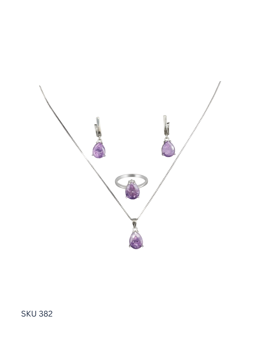 Jewelry set with purple gemstones on a white background