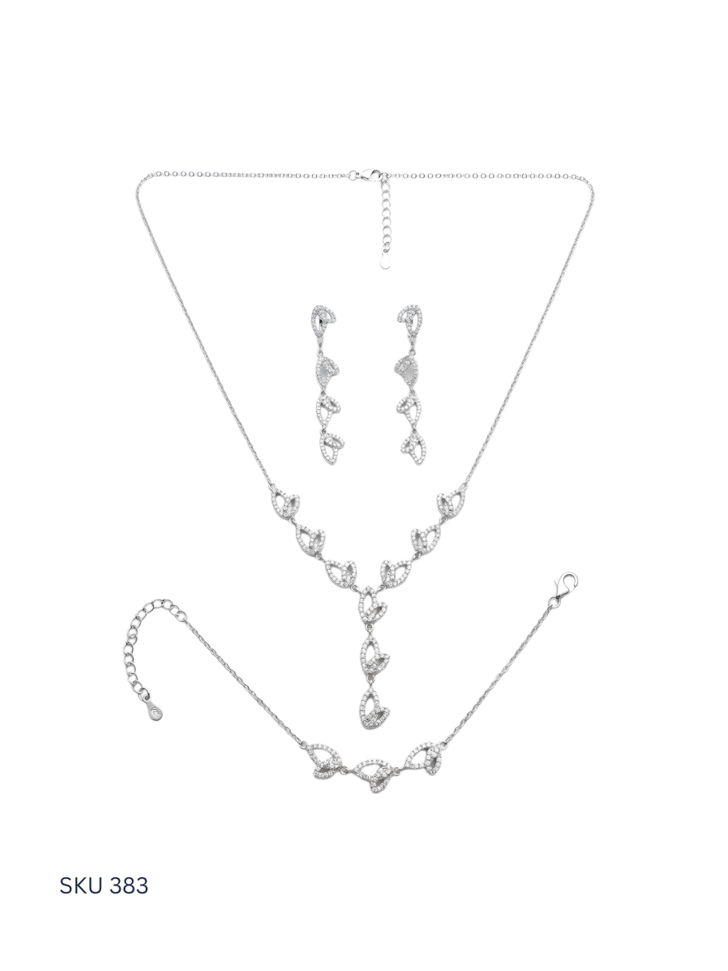 Silver jewelry set with necklace, earrings, and bracelet on a white background