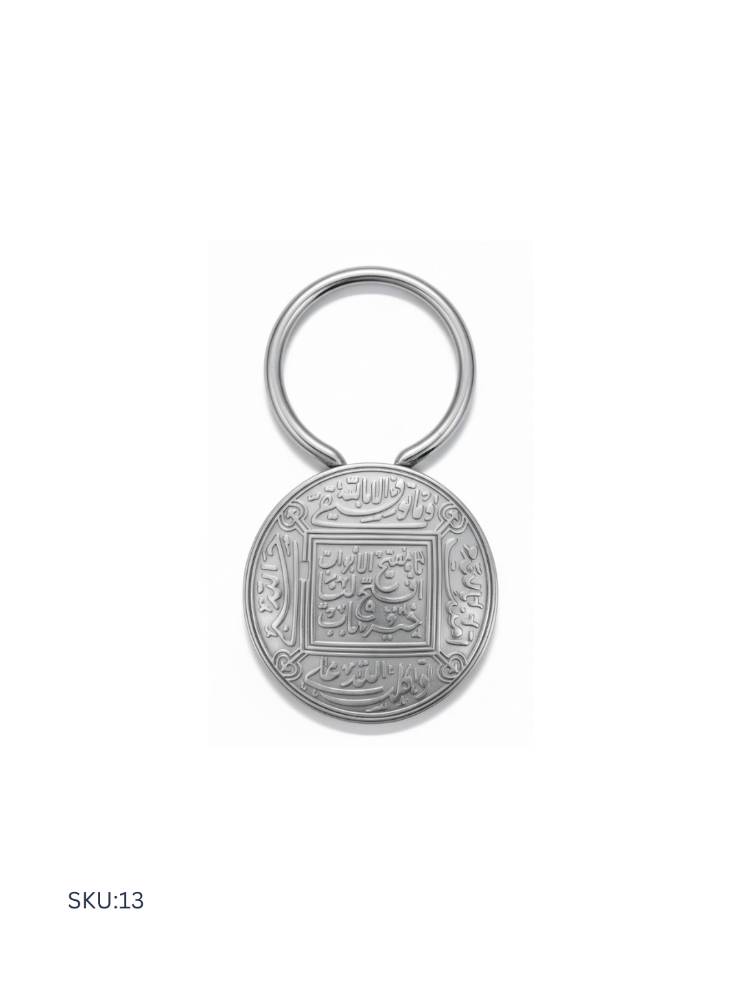 A premium Egyptian silver medal keychain made from 800 silver purity, featuring an Islamic-inspired design with refined finishing. This elegant piece reflects cultural heritage with elevated craftsmanship, ideal for meaningful gifting.