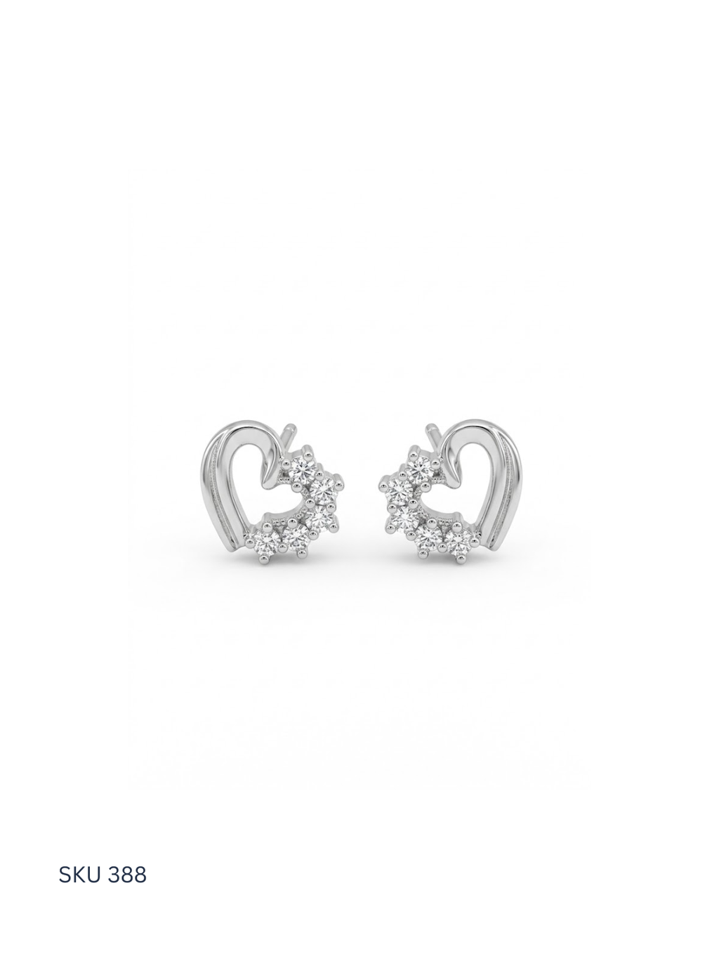 Heart-shaped silver earrings with clear stones on a white background