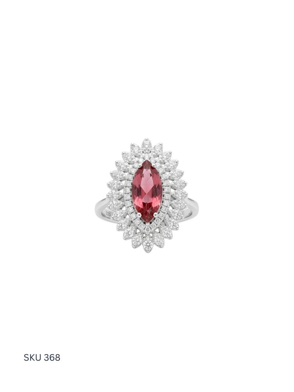 Silver ring with a red gemstone on a white background