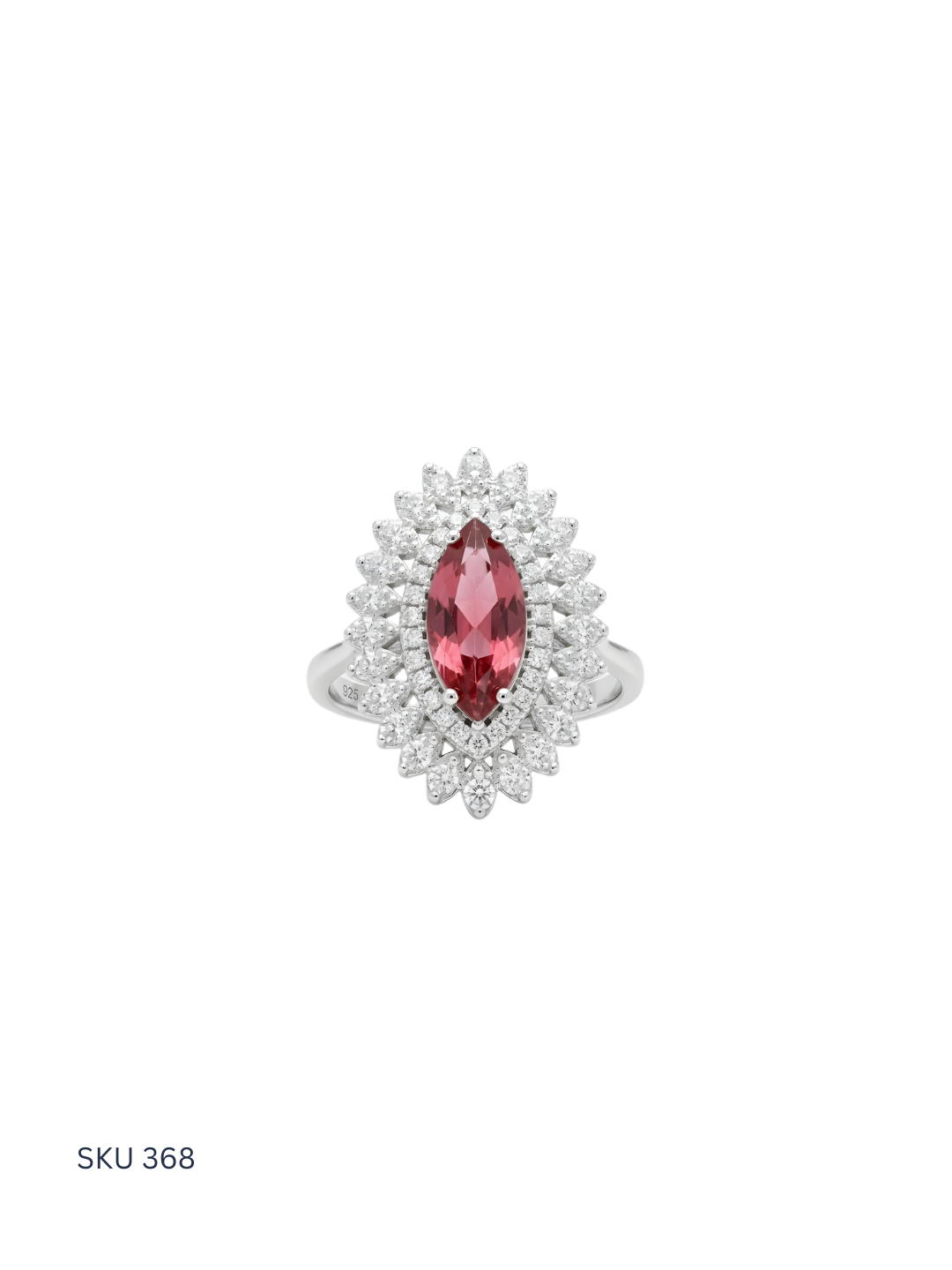 Silver ring with a red gemstone on a white background