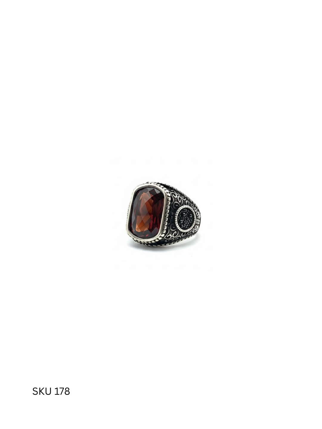 A best-selling men’s ring crafted from Turkish 925 sterling silver and set with a vibrant orange stone. Bold and distinctive, it adds character to modern masculine styling.