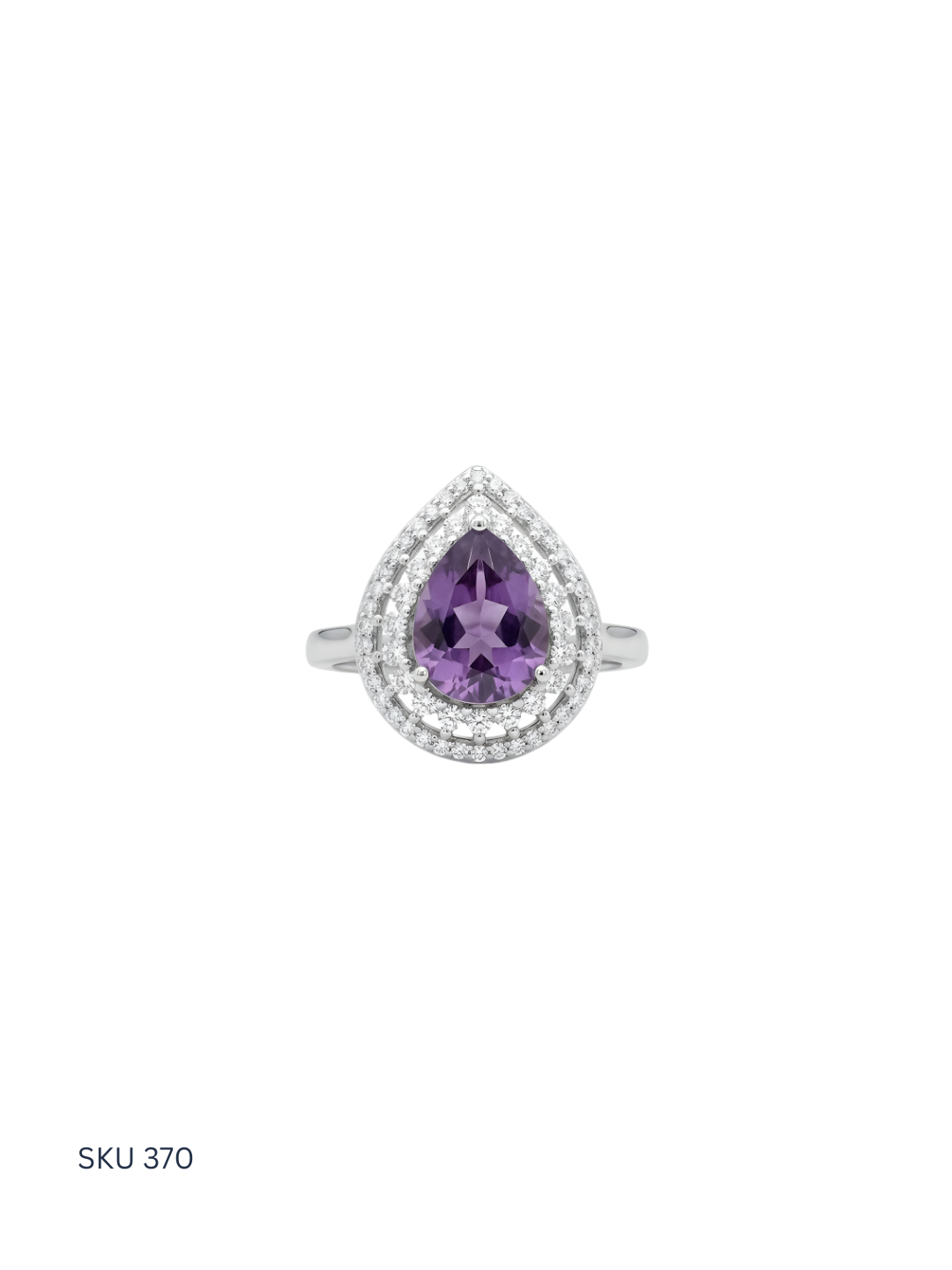 Ring with purple teardrop-shaped gemstone on a white background