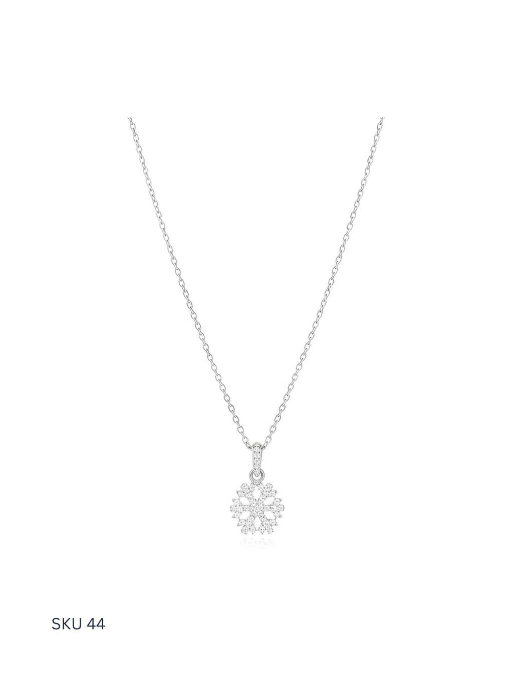 A refined Snow necklace crafted from Italian sterling silver 925 and finished with platinum plating. Inspired by delicate snowflake forms, this bestselling piece offers timeless elegance and light-catching brilliance, making it suitable for both everyday wear and gifting.