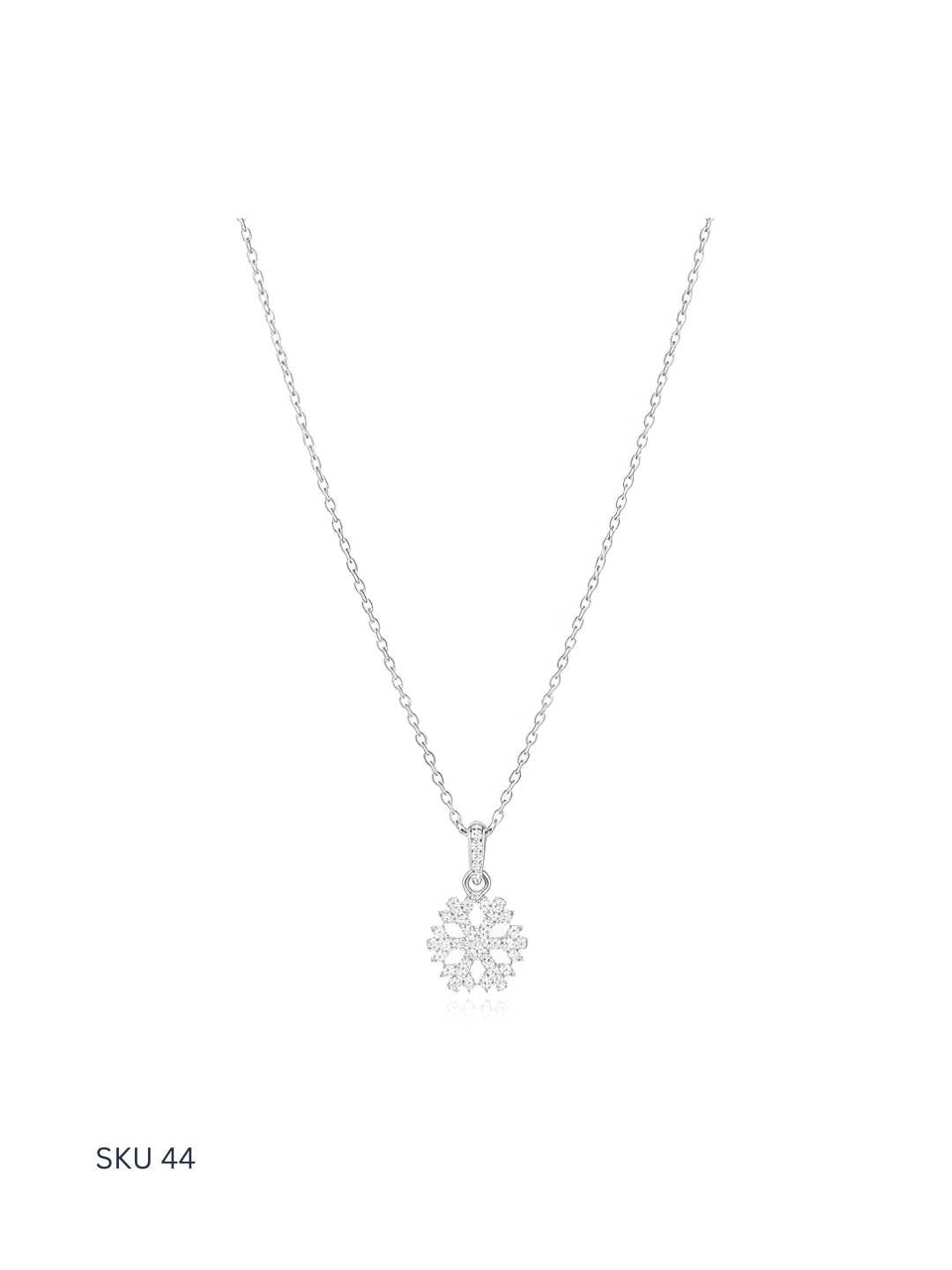 A refined Snow necklace crafted from Italian sterling silver 925 and finished with platinum plating. Inspired by delicate snowflake forms, this bestselling piece offers timeless elegance and light-catching brilliance, making it suitable for both everyday wear and gifting.